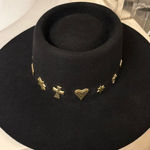 Lack of color rancher, hat, black size large, with gold detail gently used